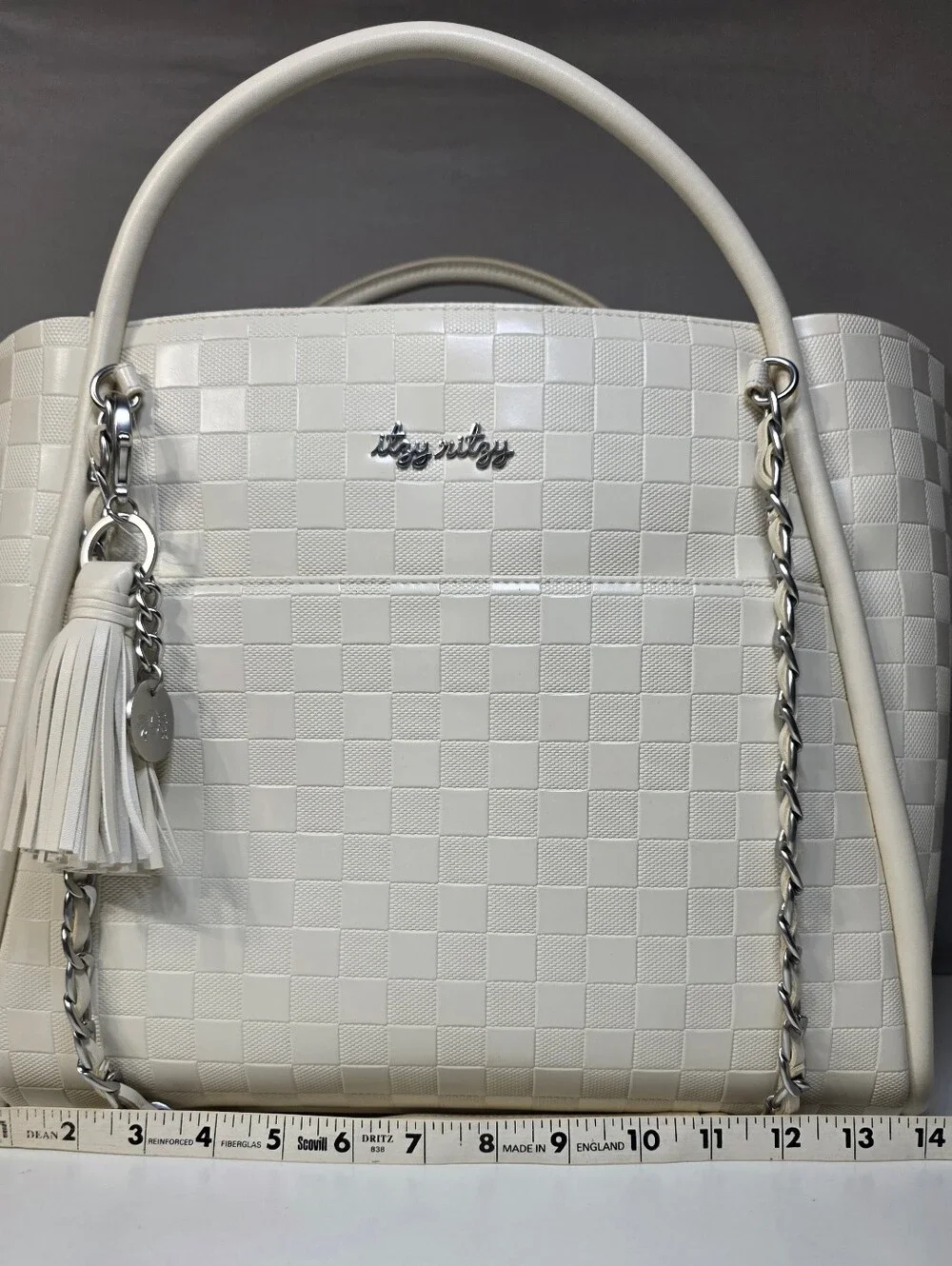 Itzy Ritzy Boss Tote Diaper Bag Limited-edition checkered pattern.
